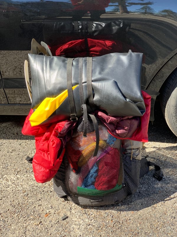 ultralight backpack with kokopelli packraft