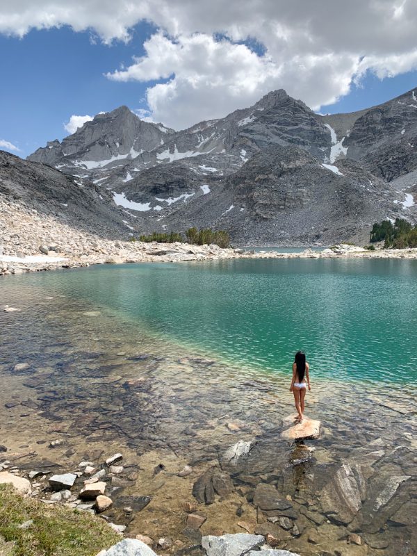girl at treasure lakes, little lakes valley, glacial lakes, eastern sierra california