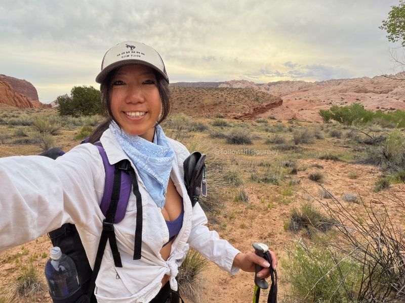 asian backpacker at halls creek narrows junction
