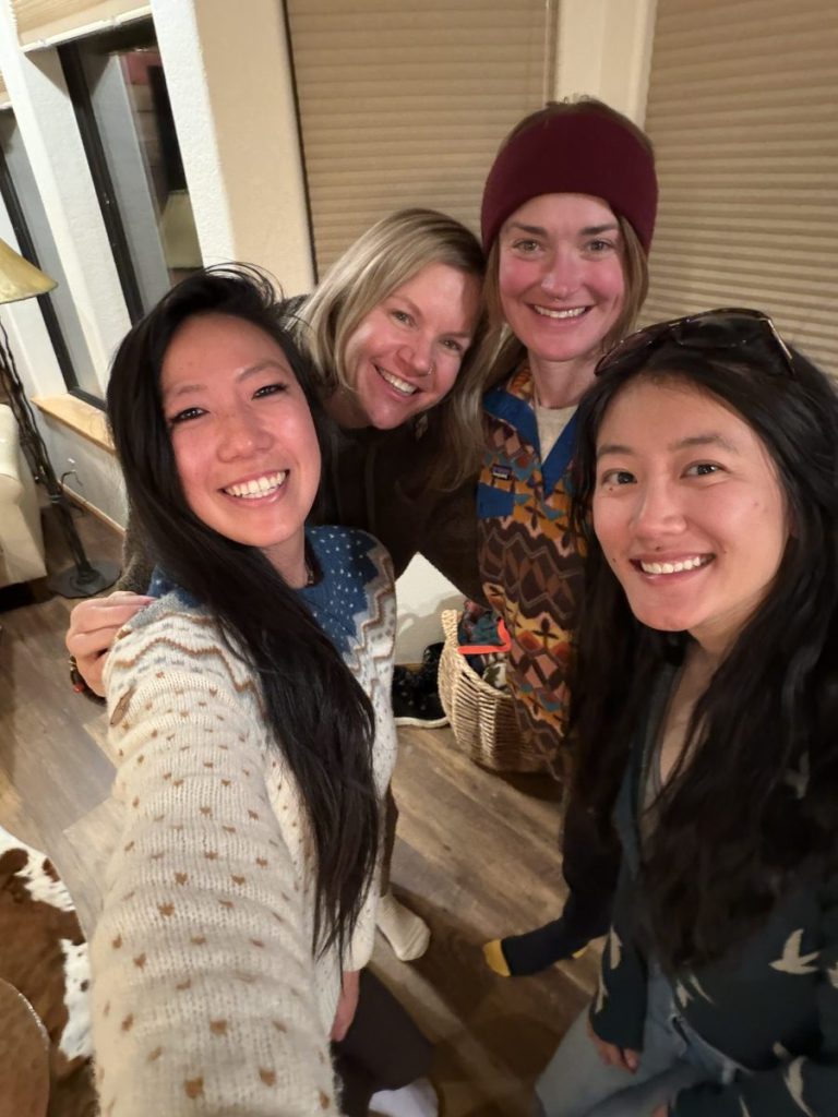 Women sharing a cozy evening together at the retreat house